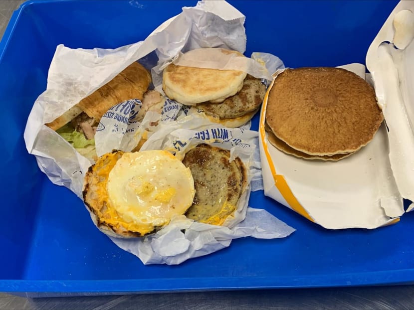 This undated handout photograph released by Australia's ministry of agriculture on Aug 1, 2022 shows McDonald's breakfast food items seized by Australian border guards from a traveller arriving from Indonesia, as part of strict biosecurity laws upon entering the country, at Darwin airport.