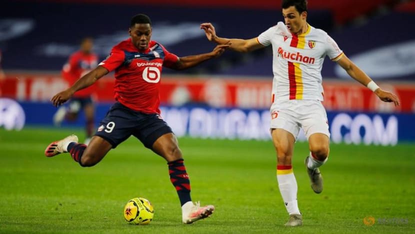Football: Lille go top as Lens see red in northern derby Football: Lille go top as Lens see red in northern derby