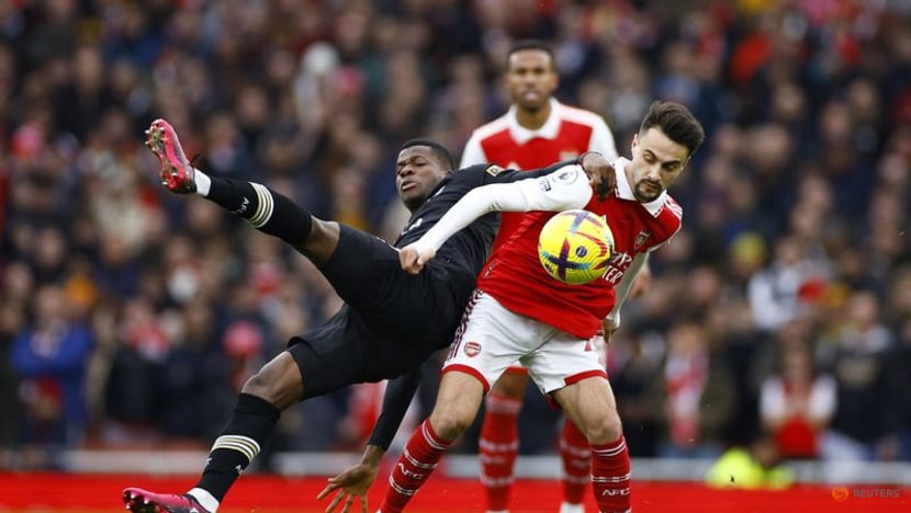 Nelson keeps Arsenal on course in title race with late winner Nelson keeps Arsenal on course in title race with late winner