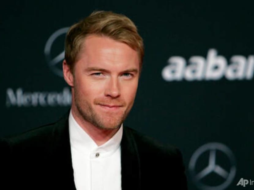 Singer Ronan Keating accepts damages in tabloid phone hacking case