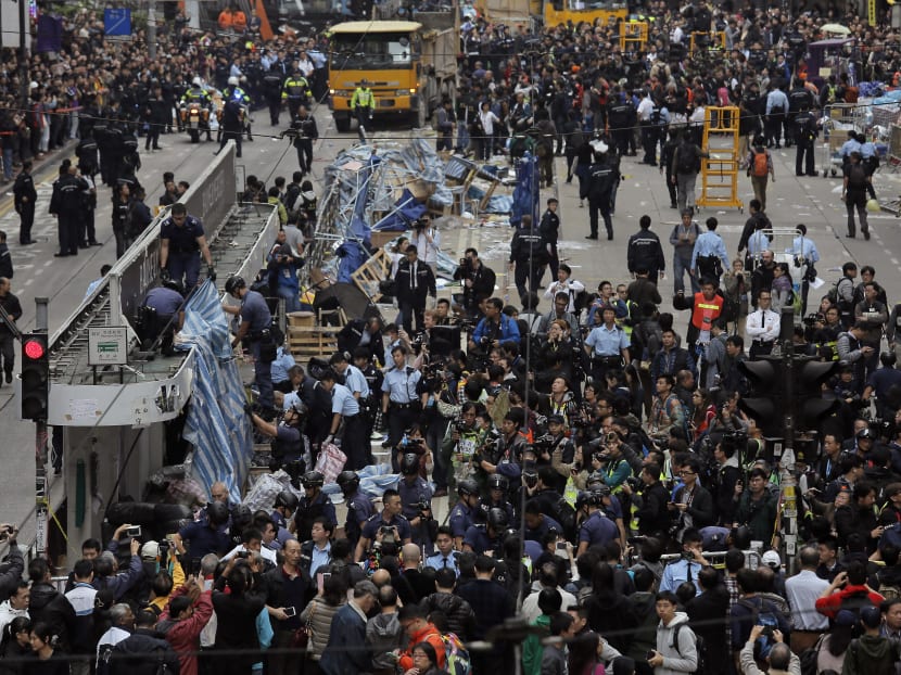 Hong Kong police close last protest site, arrest protesters