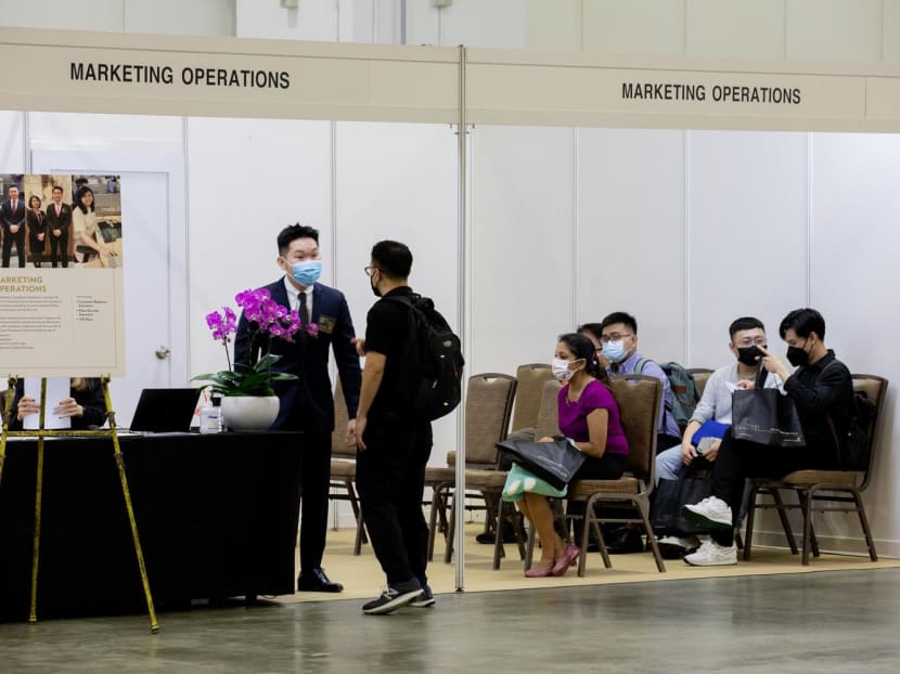 A job fair at the Sands Expo and Convention Centre on May 31, 2022. Stories of successful job hunts by fresh graduates have become more common this year amid an increasingly buoyant job market — a stark turnaround from the situation that the graduating cohorts in 2020 and 2021 faced when the pandemic threw everything helter-skelter.