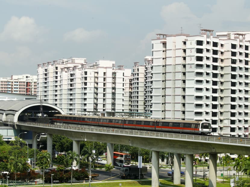 Singapore housing and MRT train, 24 Apr 2014. Photo: Ernest Chua/TODAY