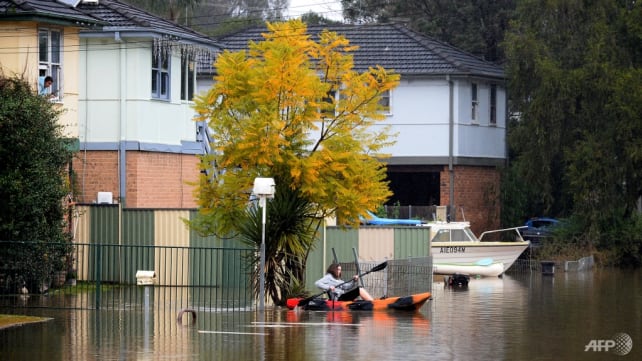 Sydney residents assess flood damage as wild weather eases