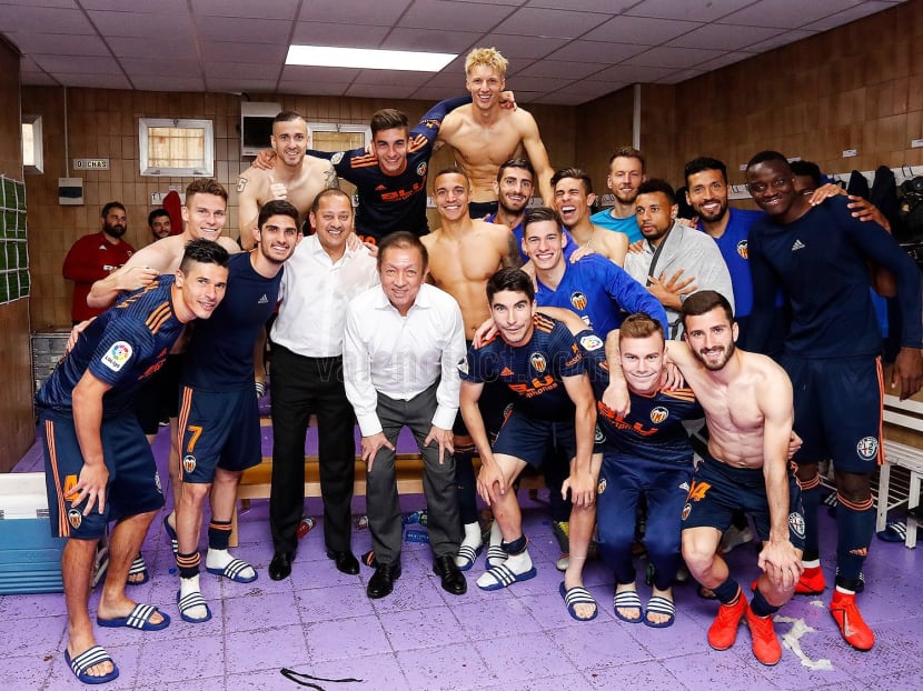 Mr Peter Lim and Valencia president Anil Murthy with Valencia players in a photo taken on May 19, 2019.