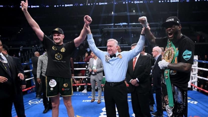 Boxing: Wilder retains heavyweight crown after Fury thriller ends in draw Boxing: Wilder retains heavyweight crown after Fury thriller ends in draw