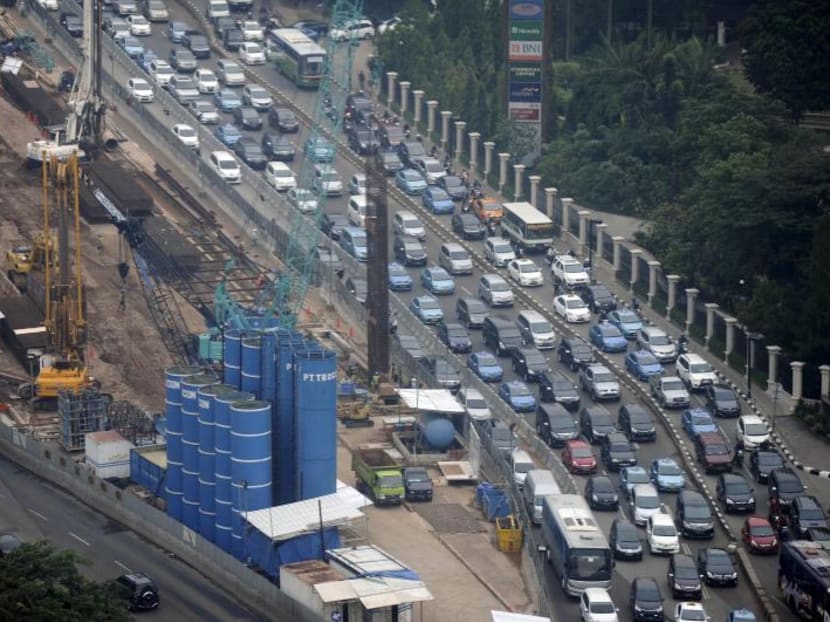Vehicles move past the construction of a new rail line in central Jakarta. Indonesian President Joko Widodo been touring provinces in Kalimantan to survey possible locations for a new capital, The Jakarta Post reported. Vehicles move past the construction of a new rail line in central Jakarta. Indonesian President Joko Widodo been touring provinces in Kalimantan to survey possible locations for a new capital, The Jakarta Post reported.