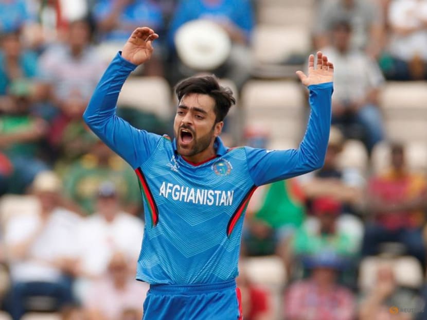 FILE PHOTO: Cricket - ICC Cricket World Cup - Bangladesh v Afghanistan - The Ageas Bowl, Southampton, Britain - June 24, 2019   Afghanistan's Rashid Khan reacts   Action Images via Reuters/John Sibley