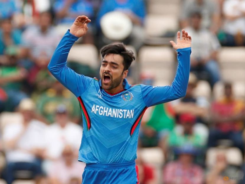 FILE PHOTO: Cricket - ICC Cricket World Cup - Bangladesh v Afghanistan - The Ageas Bowl, Southampton, Britain - June 24, 2019 Afghanistan's Rashid Khan reacts Action Images via Reuters/John Sibley FILE PHOTO: Cricket - ICC Cricket World Cup - Bangladesh v Afghanistan - The Ageas Bowl, Southampton, Britain - June 24, 2019 Afghanistan's Rashid Khan reacts Action Images via Reuters/John Sibley