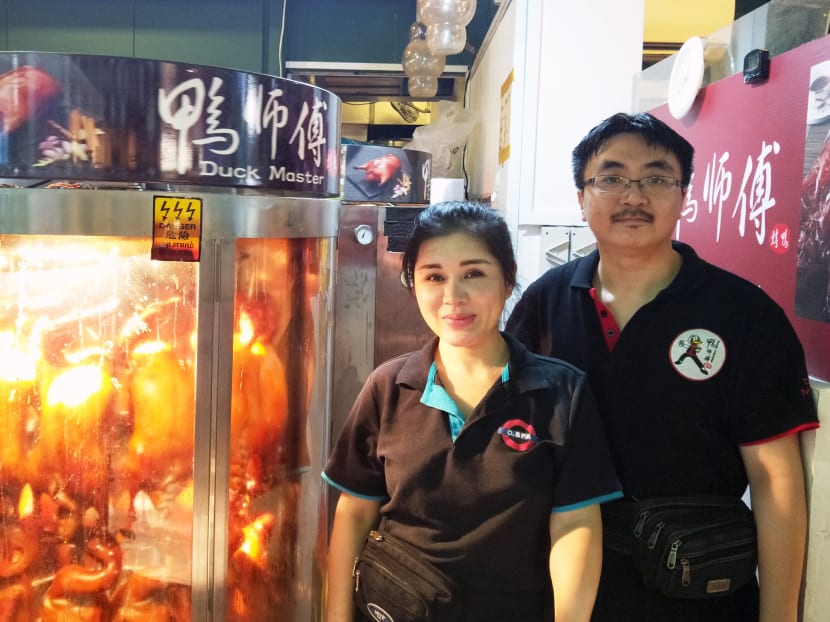 Duck Master is typically manned by three staff members, including Wawa Peng (left), who is in charge of the day-to-day operations, and former food photographer turned chief duck roaster Paul Boh. Photo: Faith Wong/TODAY
