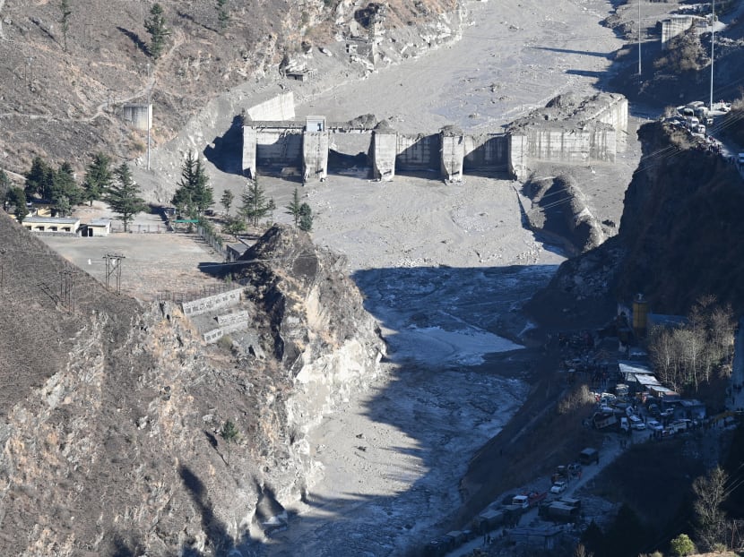 A general view shows the remains of a dam along a river in Tapovan of Chamoli district on February 8, 2021 damaged after a flash flood thought to have been caused when a glacier broke off on February 7.