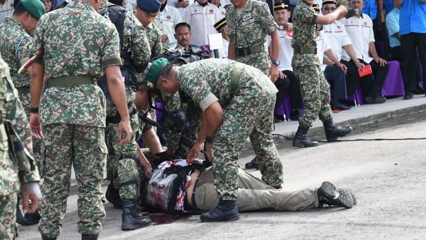 Malaysian commando shot dead in live-firing demo; police investigating Malaysian commando shot dead in live-firing demo; police investigating