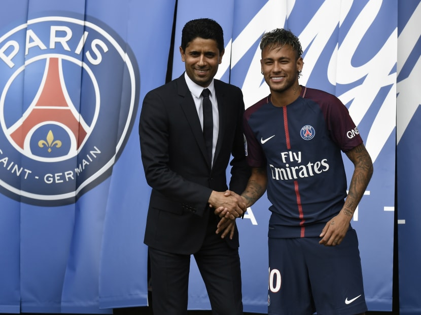 Neymar (right) with PSG president Nasser Al-Khelaifi at the Brazilian's unveiling on Friday. Photo: AFP