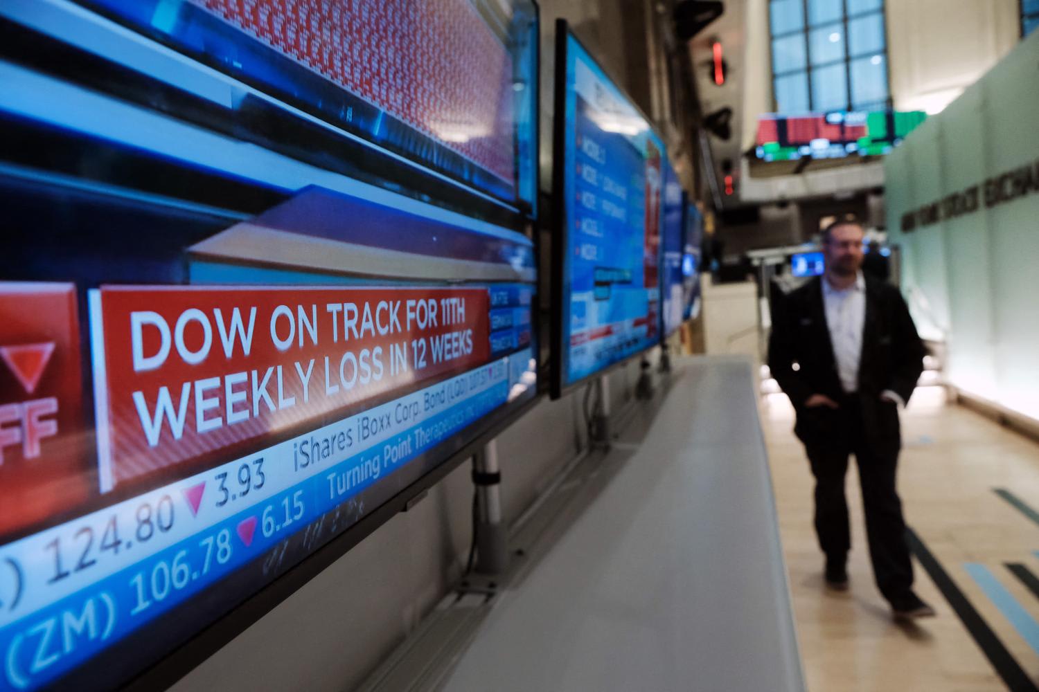 Traders work on the floor of the New York Stock Exchange (NYSE) on June 16, 2022 in New York City. Stocks fell sharply in morning trading as investors react to the Federal Reserve's largest rate hike since 1994. Traders work on the floor of the New York Stock Exchange (NYSE) on June 16, 2022 in New York City. Stocks fell sharply in morning trading as investors react to the Federal Reserve's largest rate hike since 1994.