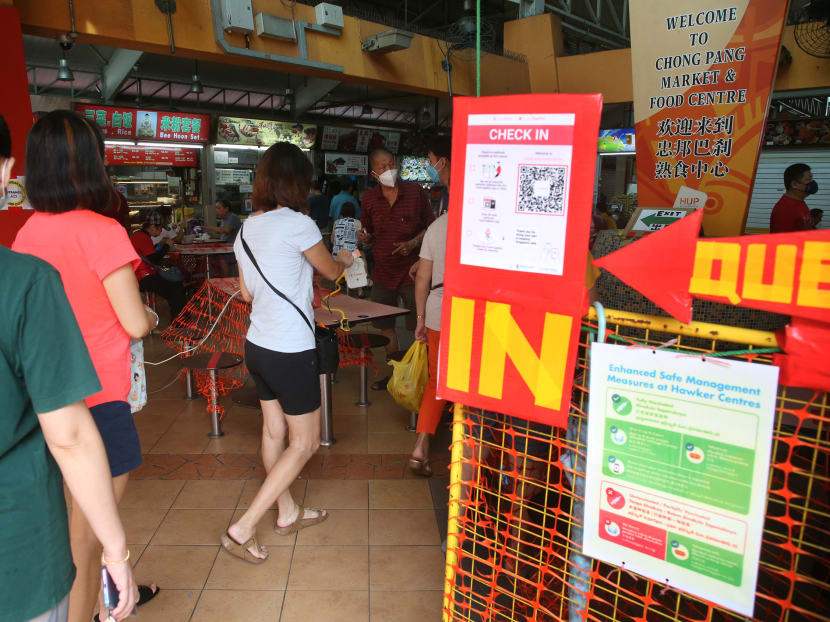 Fully vaccinated or eligible persons will be given a sticker to identify them after checks at hawker centres, while those who are not vaccinated or partially vaccinated can only buy food to take away.