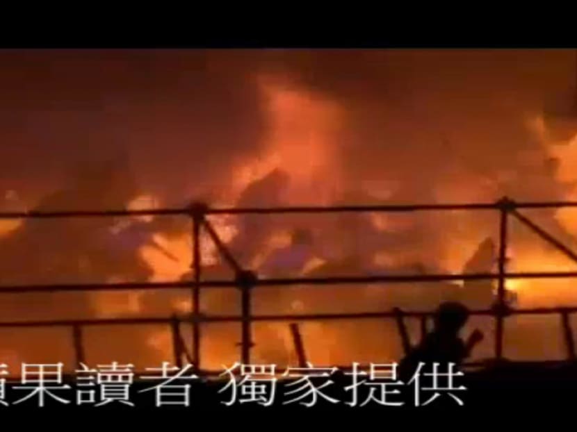In this screen grab taken from UGC by Apple Daily Taiwan, concert goers run as a fire starts at the Formosa Water Park in New Taipei City, Taiwan, Saturday, June 27, 2015. Photo: AP
