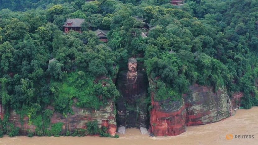 China evacuates 100,000 as floods threaten heritage site China evacuates 100,000 as floods threaten heritage site