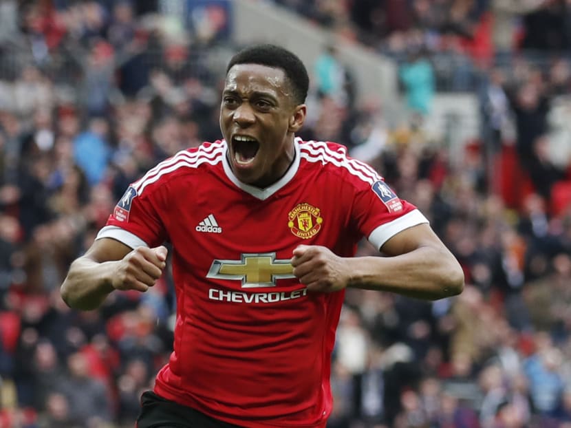 Martial scores late to send Man United into FA Cup final