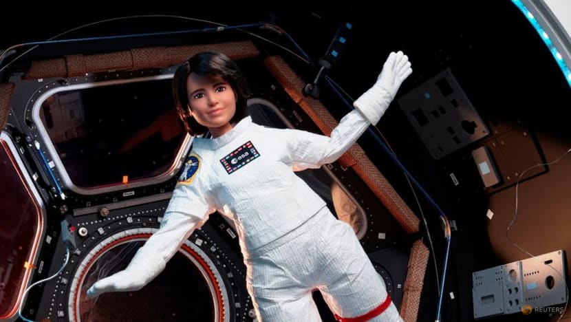 Space station's Italian commander, with lookalike Barbie, tells girls about science in orbit Space station's Italian commander, with lookalike Barbie, tells girls about science in orbit