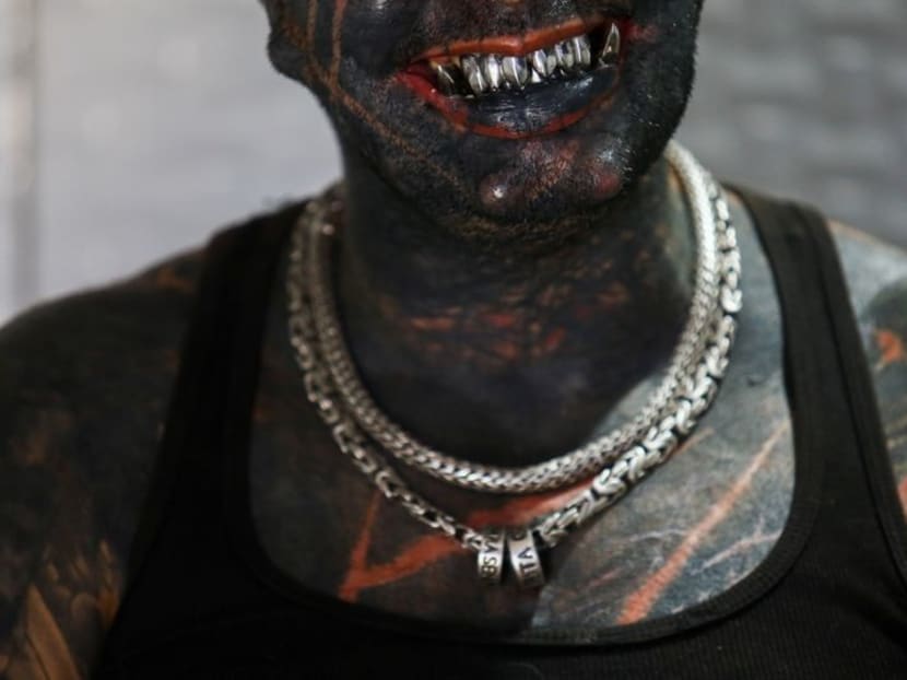 'The sinister attracted me': Brazilian tattoo artist morphs into devil look-alike 'The sinister attracted me': Brazilian tattoo artist morphs into devil look-alike
