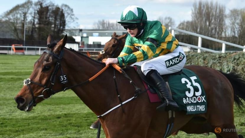 Horse racing-Blackmore makes history with Grand National win on Minella Times Horse racing-Blackmore makes history with Grand National win on Minella Times