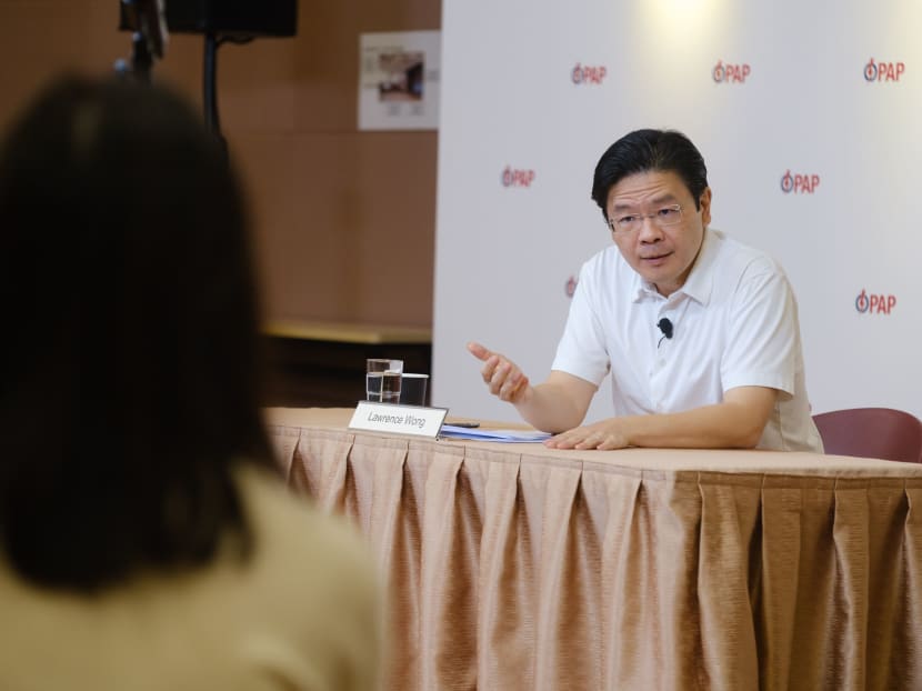 The People's Action Party's Lawrence Wong speaking to party activists at the party's headquarters in Bedok.