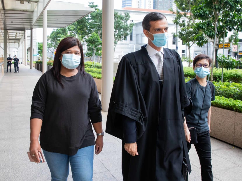 Ms Parti Liyani (left) and her lawyer Anil Balchandani (centre) outside the High Court on Oct 27, 2020. Ms Parti Liyani (left) and her lawyer Anil Balchandani (centre) outside the High Court on Oct 27, 2020.