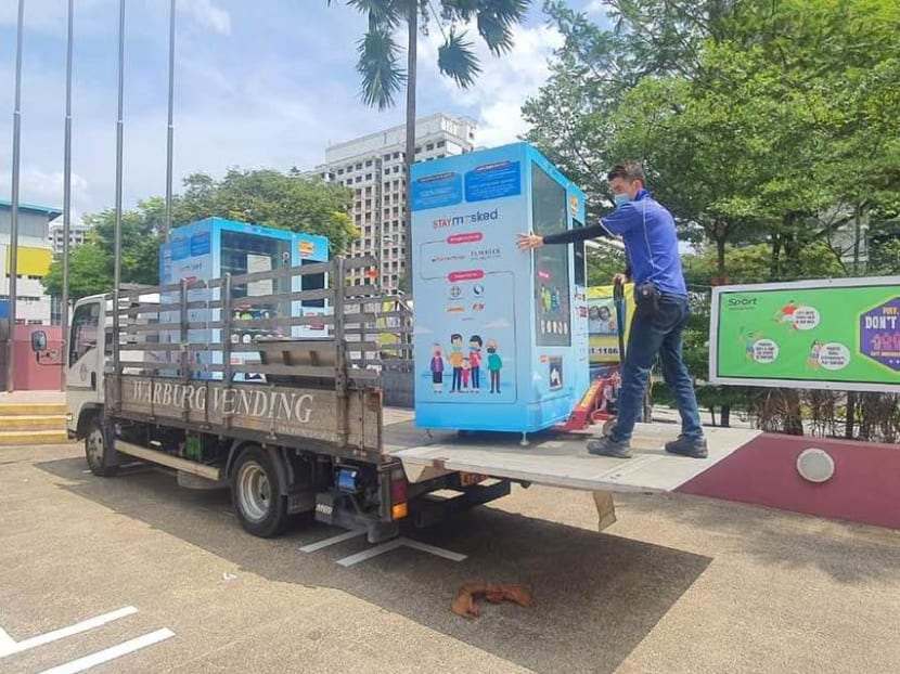 Masks vending machines at 20 community centres have been moved to adjacent HDB blocks, as the centres will be used for the national Covid-19 vaccination rollout.