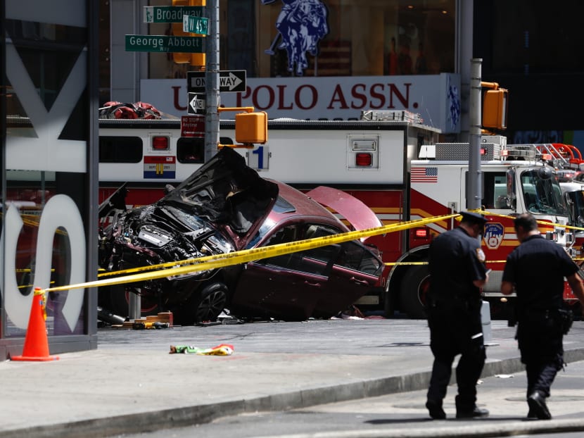 A smashed car sits on the corner of Broadway and 45th Street in New York's Times Square after ploughing through a crowd of pedestrians at lunchtime on Thursday, May 18, 2017. Police do not suspect a link to terrorism and the driver was taken into custody to be tested for alcohol. Photo: AP
