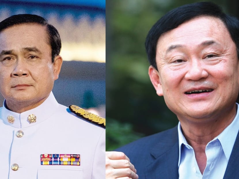 Thai Prime Minister Prayut Chan-o-cha (left) signed the order stripping fugitive ex-premier Thaksin Shinawatra (right) of his police rank on Sept 3, 2015. Photo: AP/Reuters