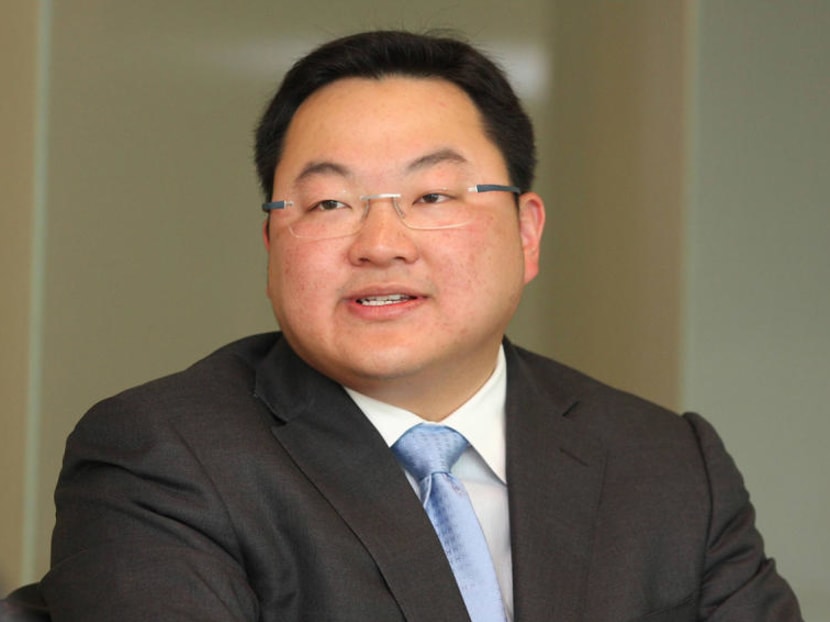 Malaysian court charges Jho Low, dad with money laundering; Interpol red notice issued for duo