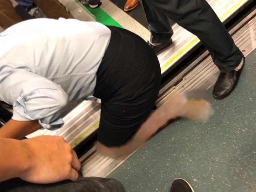 The leg of a commuter was trapped in the platform gap at Buona Vista MRT on Monday.