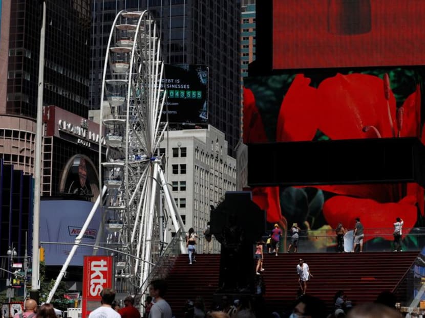 A Ferris wheel lifts spirits in New York's Times Square A Ferris wheel lifts spirits in New York's Times Square