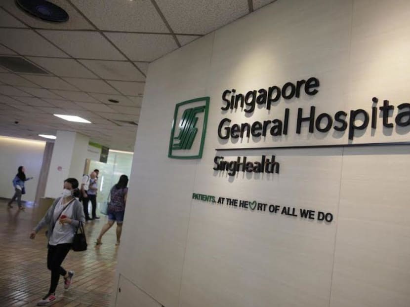 A man, whose girlfriend was arrested for suspected child abuse, handed an unconscious six-month-old baby to a nurse at Singapore General Hospital.