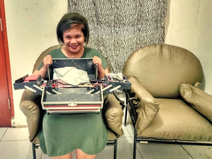Ms Gloria Elsa Hutasoit, seen at home with her beauty tool case, began her work as a free mortuary beautician in 2017.