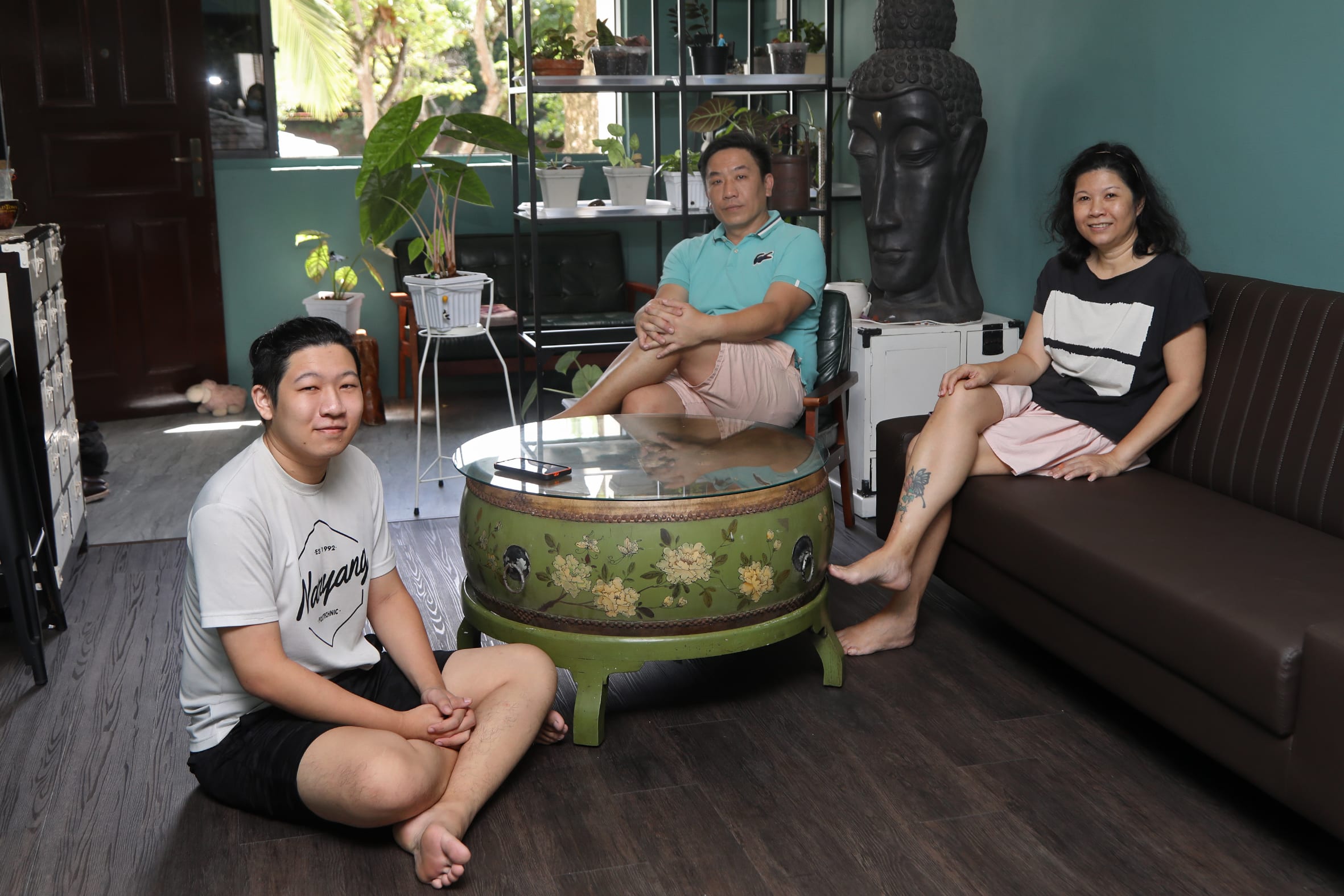 Mr Tan Chun Heng with his wife Kiong May Lee and their son Hugo. The family just moved into their Marsiling Crescent home in the middle of May 2022.