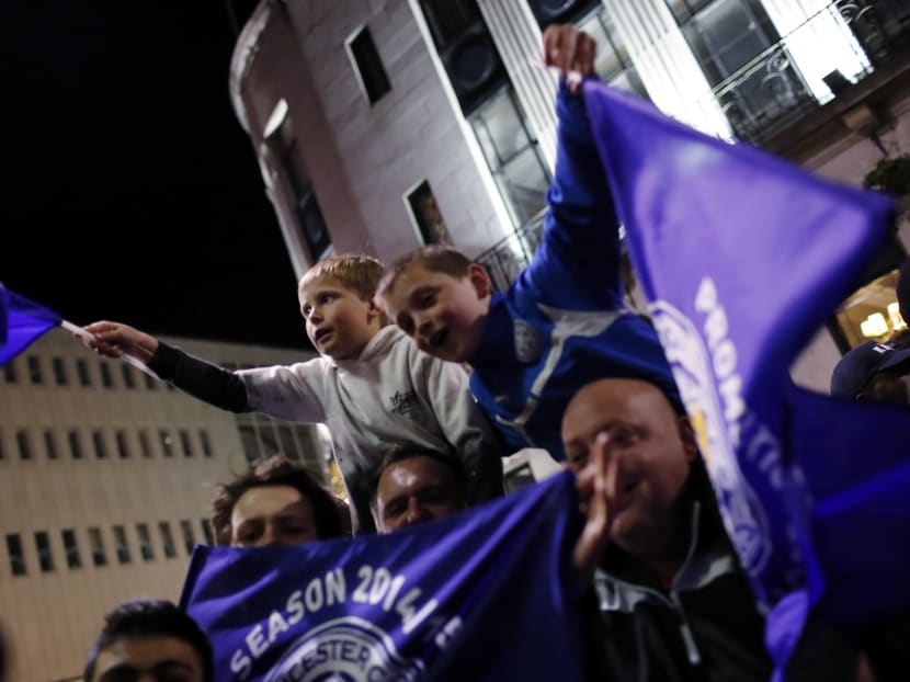 Leicester City fans celebrate winning the Premier League. Photo: Reuters