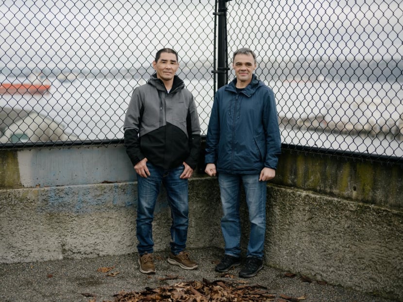 Maksim, left, and Sergey, two Russian citizens who are seeking asylum after a five-day boat journey across the Bering Sea, in downtown Tacoma, Washington after an interview at the Northwest Immigrant Rights Project, on Jan 19, 2023. The men fled Russia, opposing their country’s war with Ukraine and the expanding effort to enlist more men to fight. 