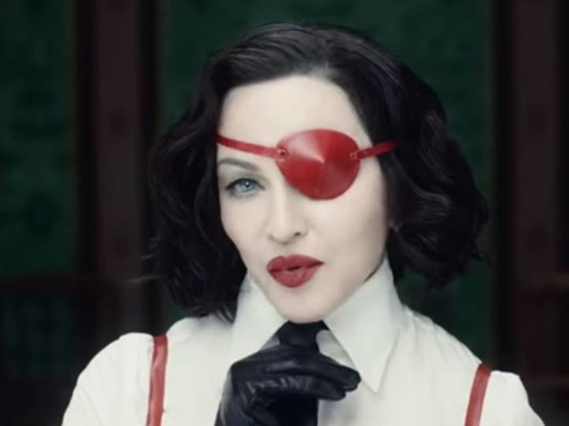 Madonna is an eye-patched seductress in raunchy cha-cha video Medellin Madonna is an eye-patched seductress in raunchy cha-cha video Medellin