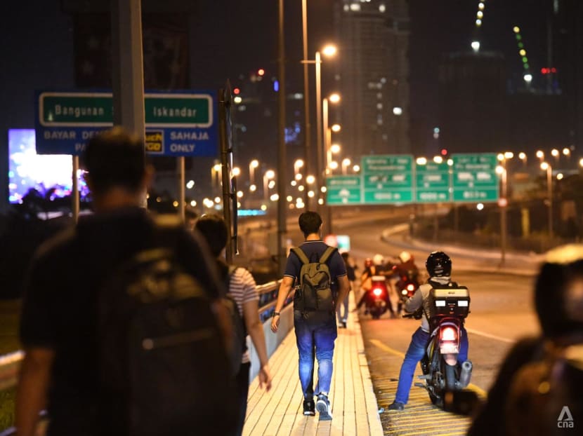 'I don't want to commute anymore': Some Malaysian workers settle in