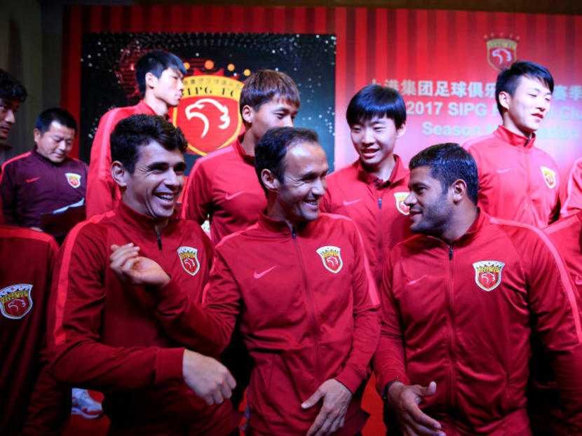 Brazilian soccer players Oscar (front, L) and Hulk (front, R) and Portuguese soccer player Ricardo Carvalho (front, C) attend the 2017 SIPG Football Club's season mobilization of the Chinese Super League, in Shanghai. Photo: Reuters