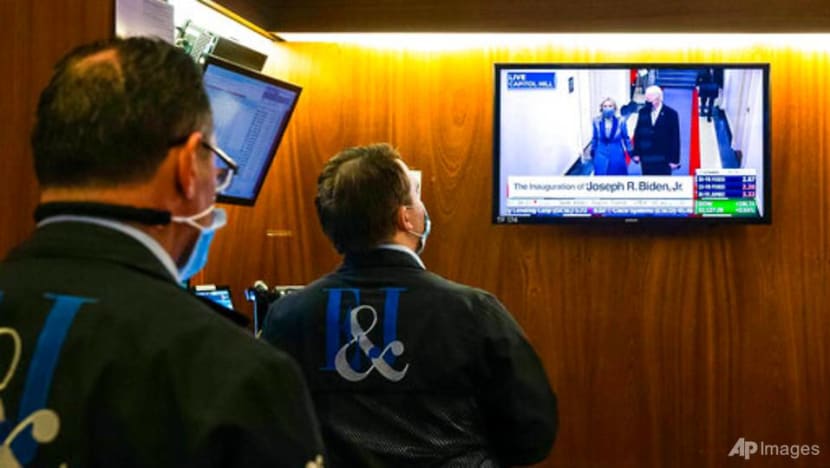 Wall Street closes at record high after Biden takes office Wall Street closes at record high after Biden takes office