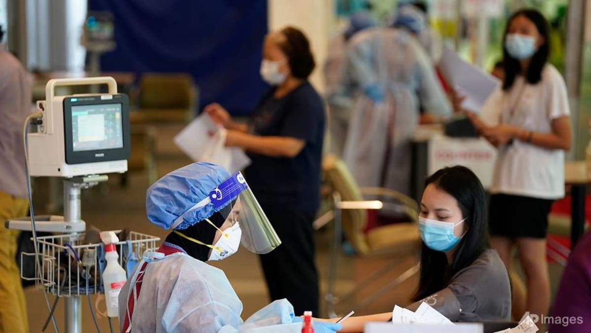 30 Of Malaysians Expected To Be Vaccinated Against Covid 19 Next Year Pm Muhyiddin Cna