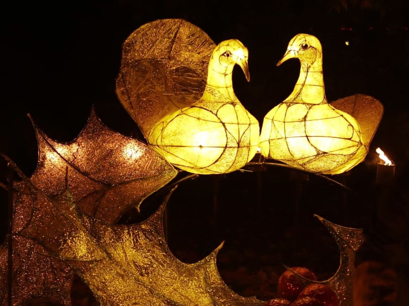 The "Two Turtle Doves" section of a "Fire Garden" display, on the eve of the public opening of the "Christmas at Kew" festival at the Royal Botanic Gardens, Kew, in London. AP file photo