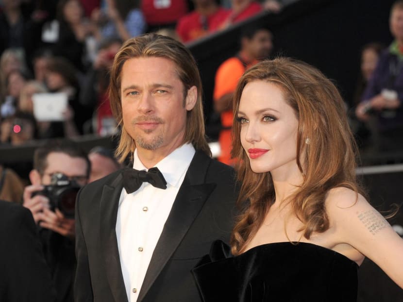 File photo taken on Feb 25, 2012 of actor Brad Pitt (left) and actress Angelina Jolie arriving at the 84th Annual Academy Awards. File photo taken on Feb 25, 2012 of actor Brad Pitt (left) and actress Angelina Jolie arriving at the 84th Annual Academy Awards.