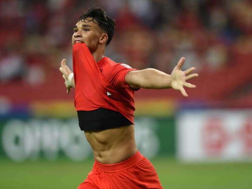 Singapore's Ikhsan Fandi celebrates scoring during the first leg of the AFF Suzuki Cup 2020 football semi-final match between Singapore and Indonesia at the National Stadium in Singapore on Dec 22, 2021. Singapore's Ikhsan Fandi celebrates scoring during the first leg of the AFF Suzuki Cup 2020 football semi-final match between Singapore and Indonesia at the National Stadium in Singapore on Dec 22, 2021.
