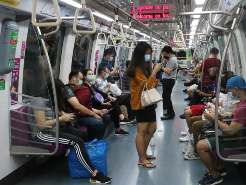 Commuters on an MRT train on the Circle Line at 7.15pm on April 19, 2020.