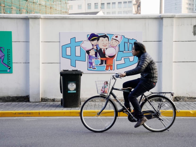 A cartoon depicting Chinese President Xi Jinping with the Chinese characters reading "Dream of China" is seen on a street in Shanghai, China. Liberals in Hong Kong fear for city’s future as China falls back on strongman rule. Photo: Reuters