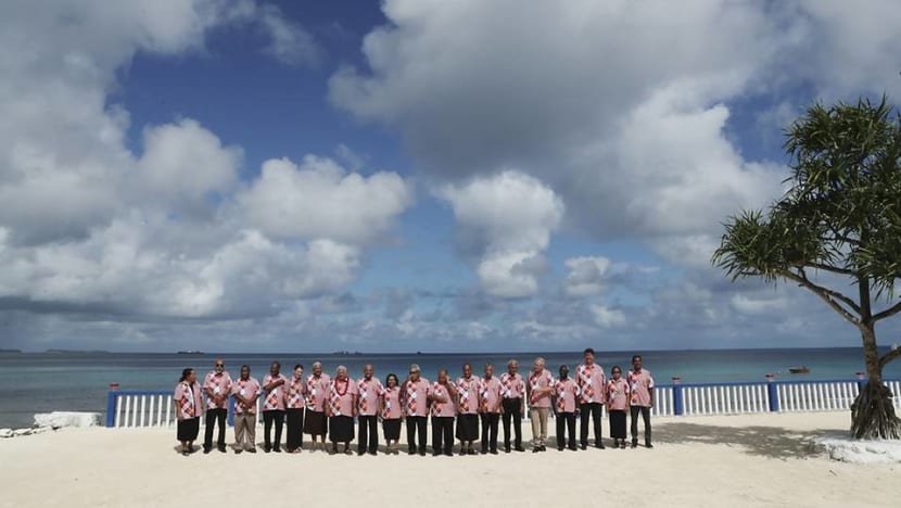 Australia dilutes Pacific leaders' climate warning Australia dilutes Pacific leaders' climate warning