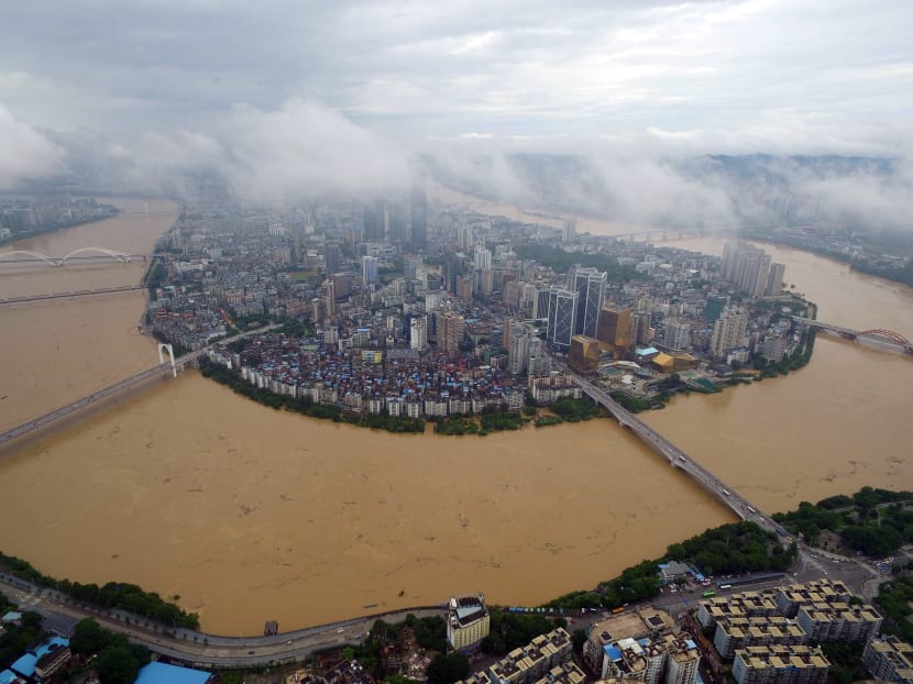 Gallery: Heavy flooding in China leaves 181 dead or missing